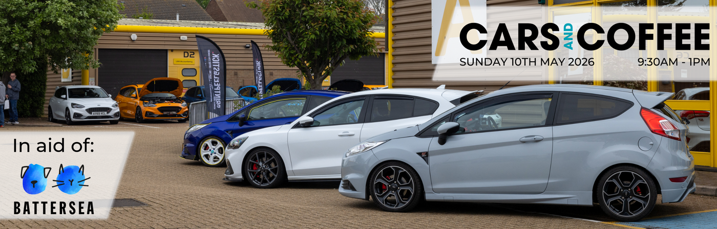 Car show event with various cars on a driveway, featuring Battersea as the charity beneficiary.