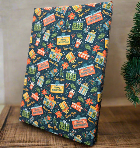 This photo consists of a printed personalised gift wrap for christmas, featuring a name and images of boxes and wrapped gifts