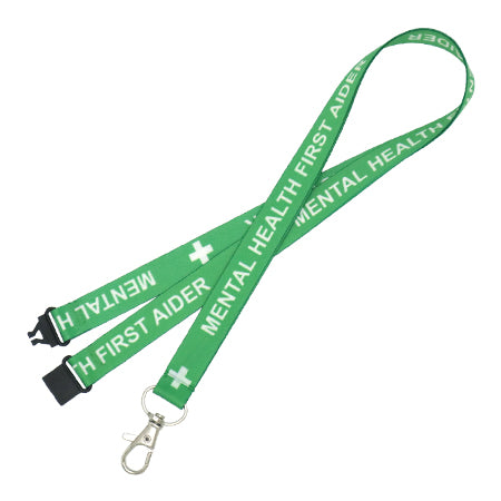 A green lanyard with 'Mental Health First Aider' text and a white cross symbol, featuring a metal clip and plastic safety break.