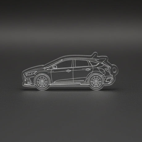 Car design etched on a metallic surface with a blurred background