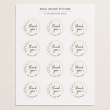 A sheet of round 40mm stickers with a botanical wreath design and the words 'thank you' in script, plus smaller text reading 'FOR YOUR GIFT' and '12 STICKERS PER SHEET' at the top.