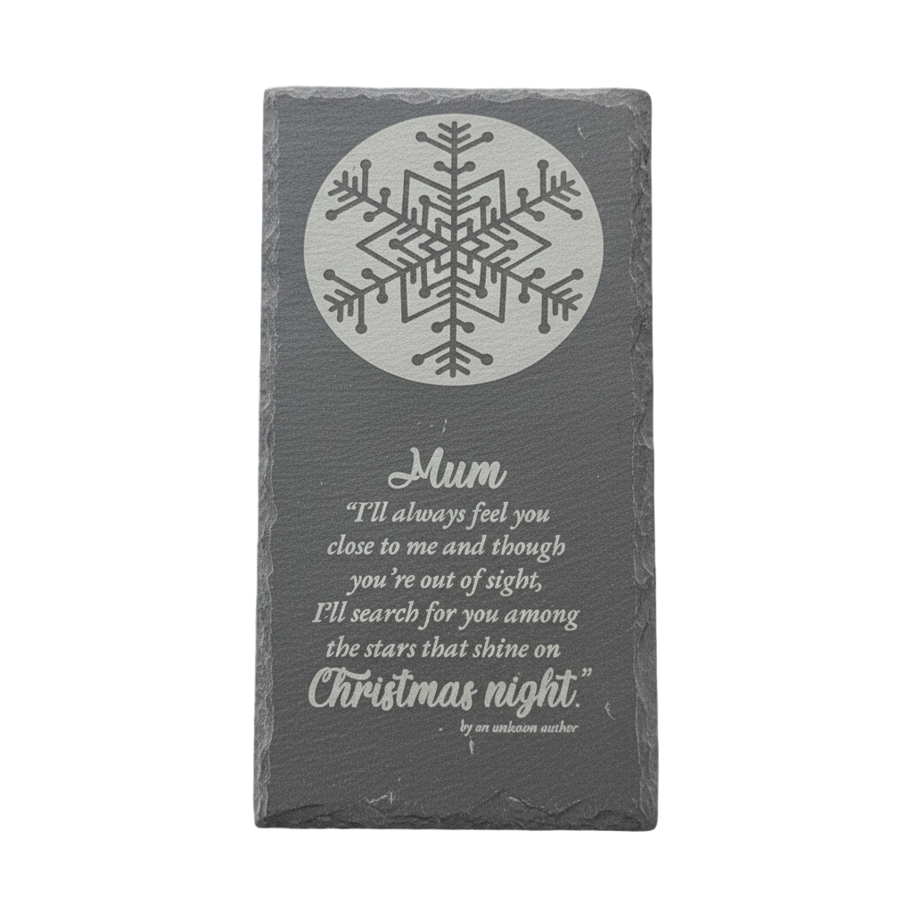 Slate with snowflake design and text on a white background