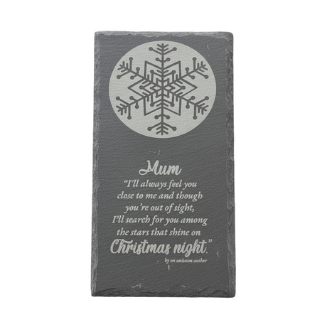 Slate with snowflake design and text on a white background