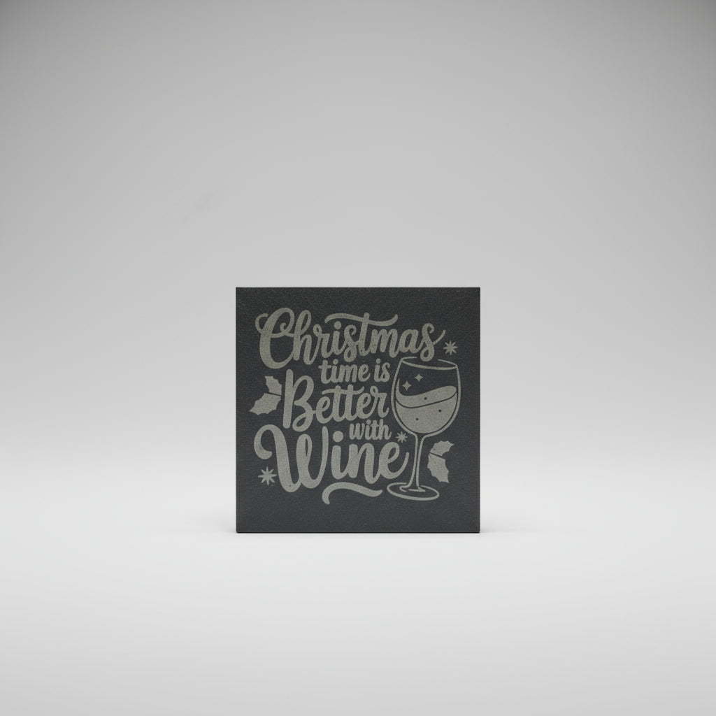 Decorative sign with 'Christmas time is better with wine' text on a dark background