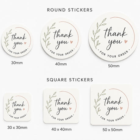 A set of round and square thank you order stickers shown in three sizes (30mm, 40mm, 50mm) on a light gray background. The stickers are cream-colored with a delicate green leaf wreath design and a small pink heart, with 'thank you' written in elegant black script.